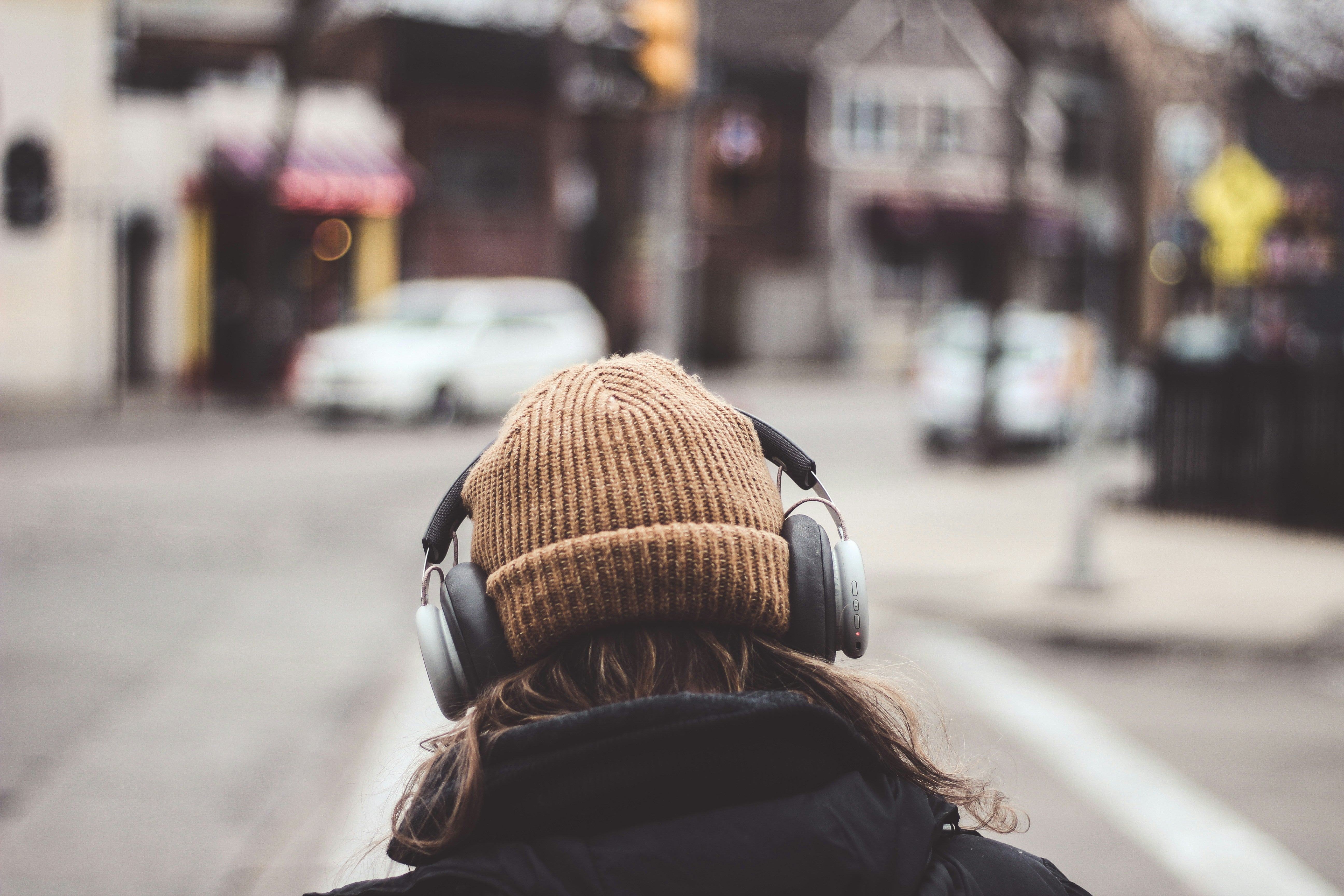 Producer listening to music with headphones — how reverb shapes the emotional experience of a record